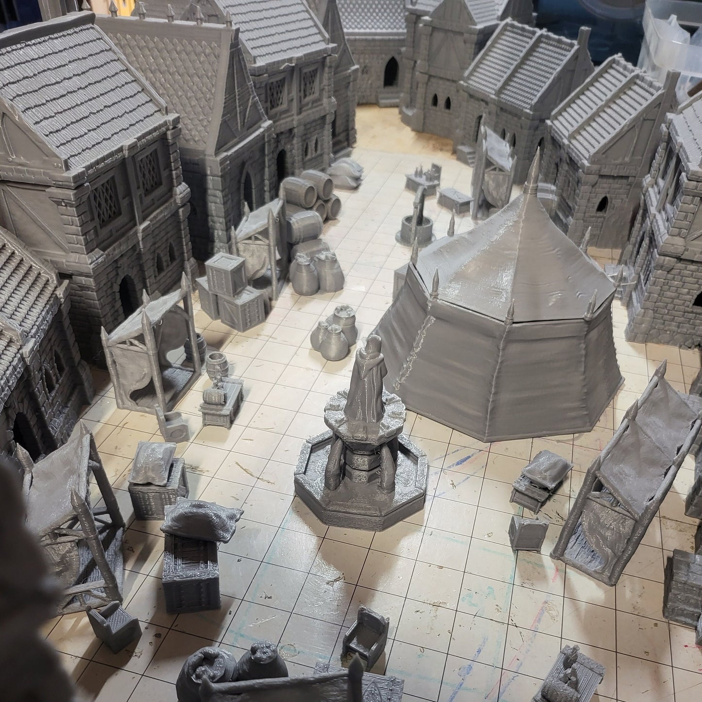 9 houses, 1 markettent, 1 clocktower, 6 market stalls, a fountain, and a street market. With everything you need in one shot, this will provide hours of fun for hobbyists & gamers. Get your hands on this fantastic set and bring your tabletop to life!