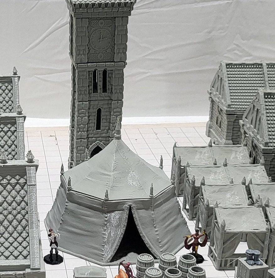 9 houses, 1 markettent, 1 clocktower, 6 market stalls, a fountain, and a street market. With everything you need in one shot, this will provide hours of fun for hobbyists & gamers. Get your hands on this fantastic set and bring your tabletop to life!