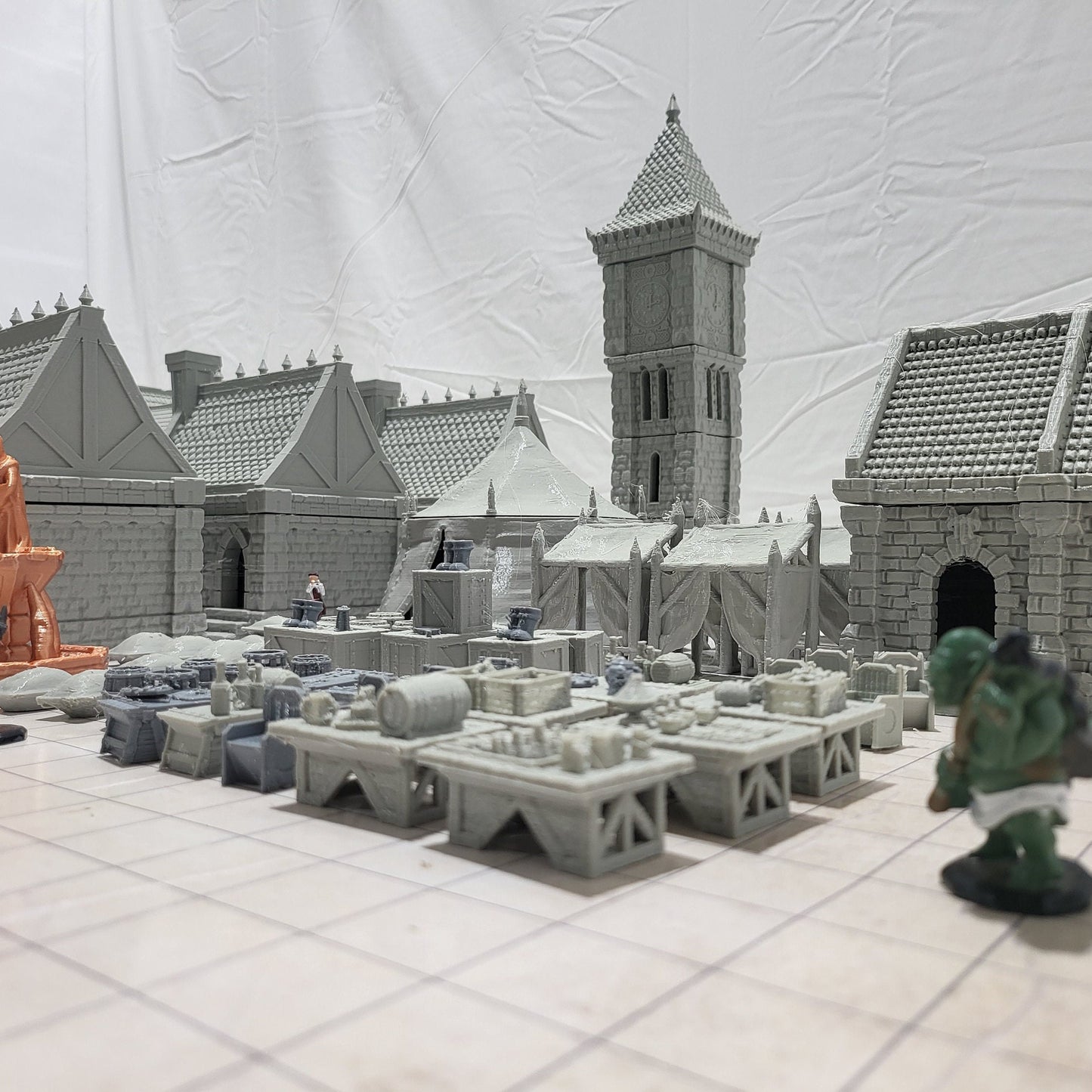 9 houses, 1 markettent, 1 clocktower, 6 market stalls, a fountain, and a street market. With everything you need in one shot, this will provide hours of fun for hobbyists & gamers. Get your hands on this fantastic set and bring your tabletop to life!