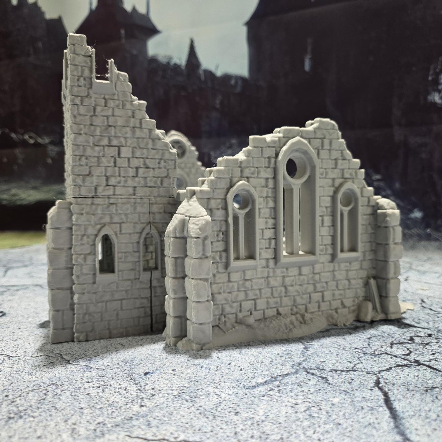 Medieval "Kasenport Church Ruin" model for tabletop gaming; features Gothic architecture with intricate details like cracked walls and stained glass remnants.