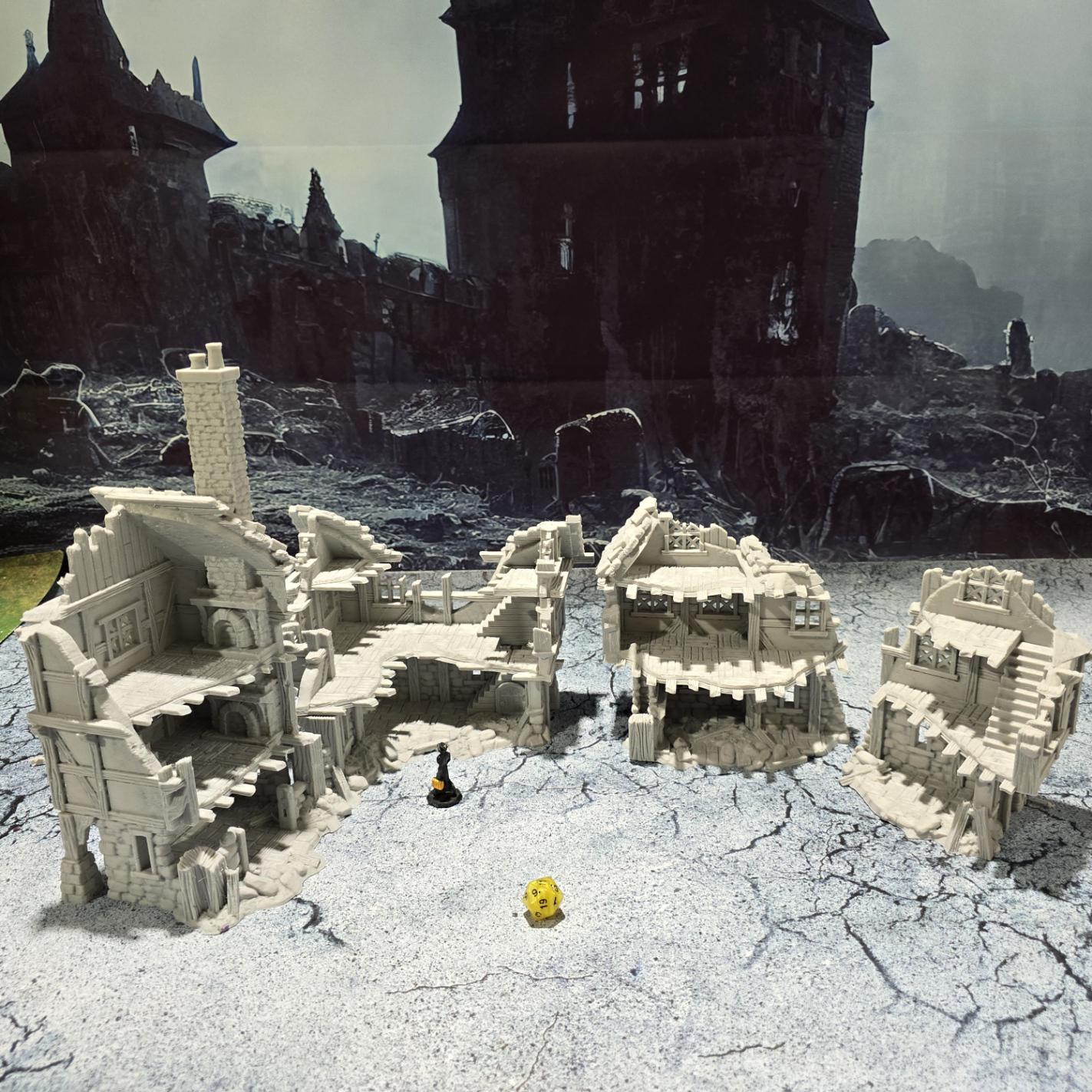 The Barrenfall Manor Ruins model features detailed remains of a medieval manor, complete with collapsed staircases, crumbling stone walls, and debris-filled rooms, perfect for creating an immersive, desolate atmosphere on your tabletop.