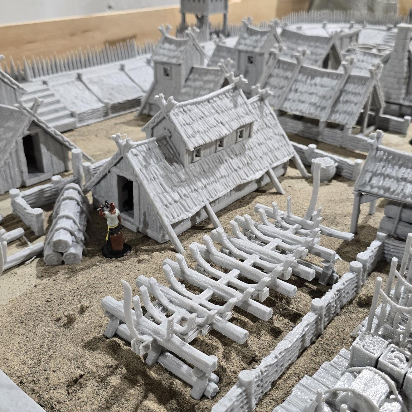 six towers adds an authentic touchThe assortment of buildings, including houses, a tavern, a storehouse, a shipbuilder's workshop, and farm buildings, offers a glimpse into various aspects of Viking life and activities.