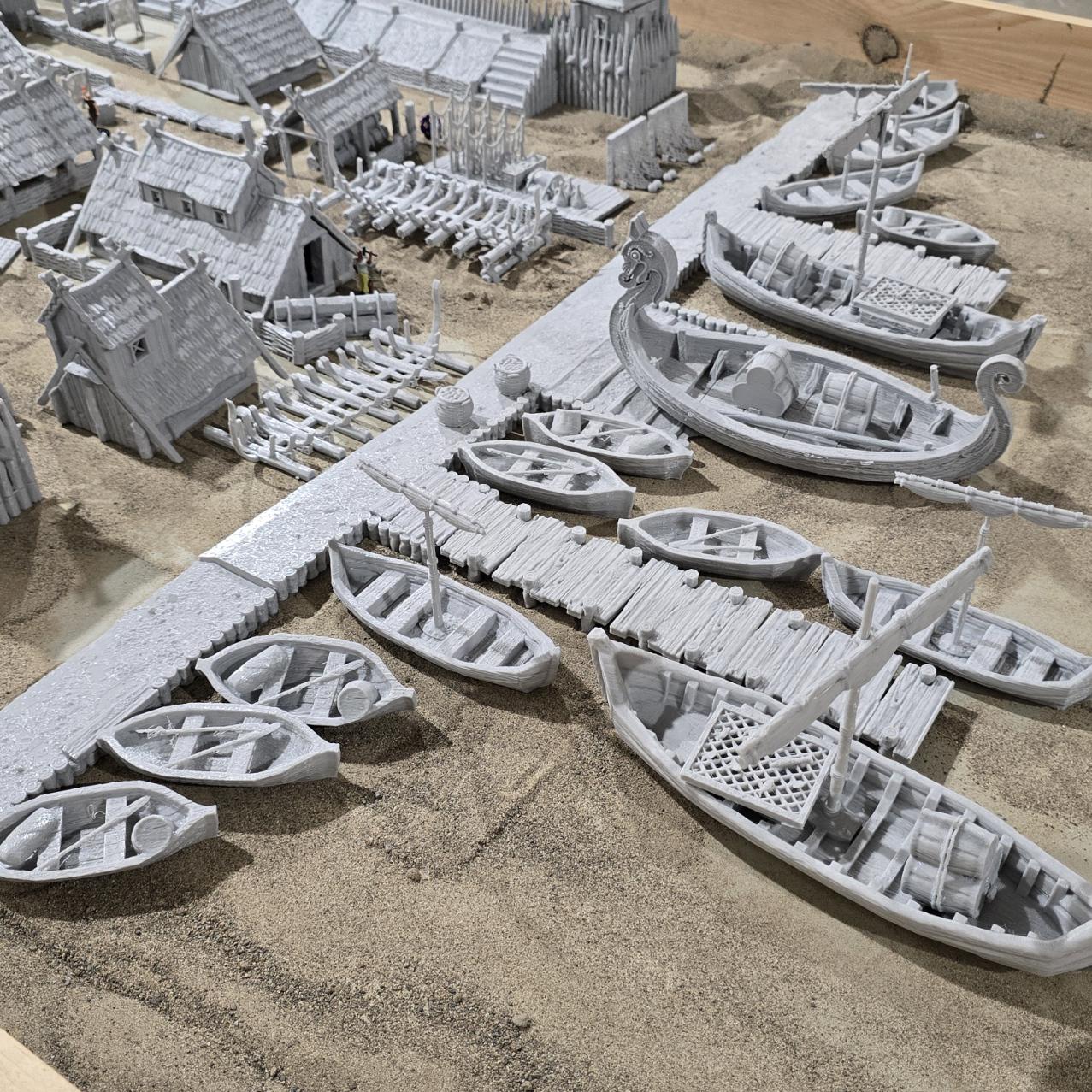 six towers adds an authentic touchThe assortment of buildings, including houses, a tavern, a storehouse, a shipbuilder's workshop, and farm buildings, offers a glimpse into various aspects of Viking life and activities.