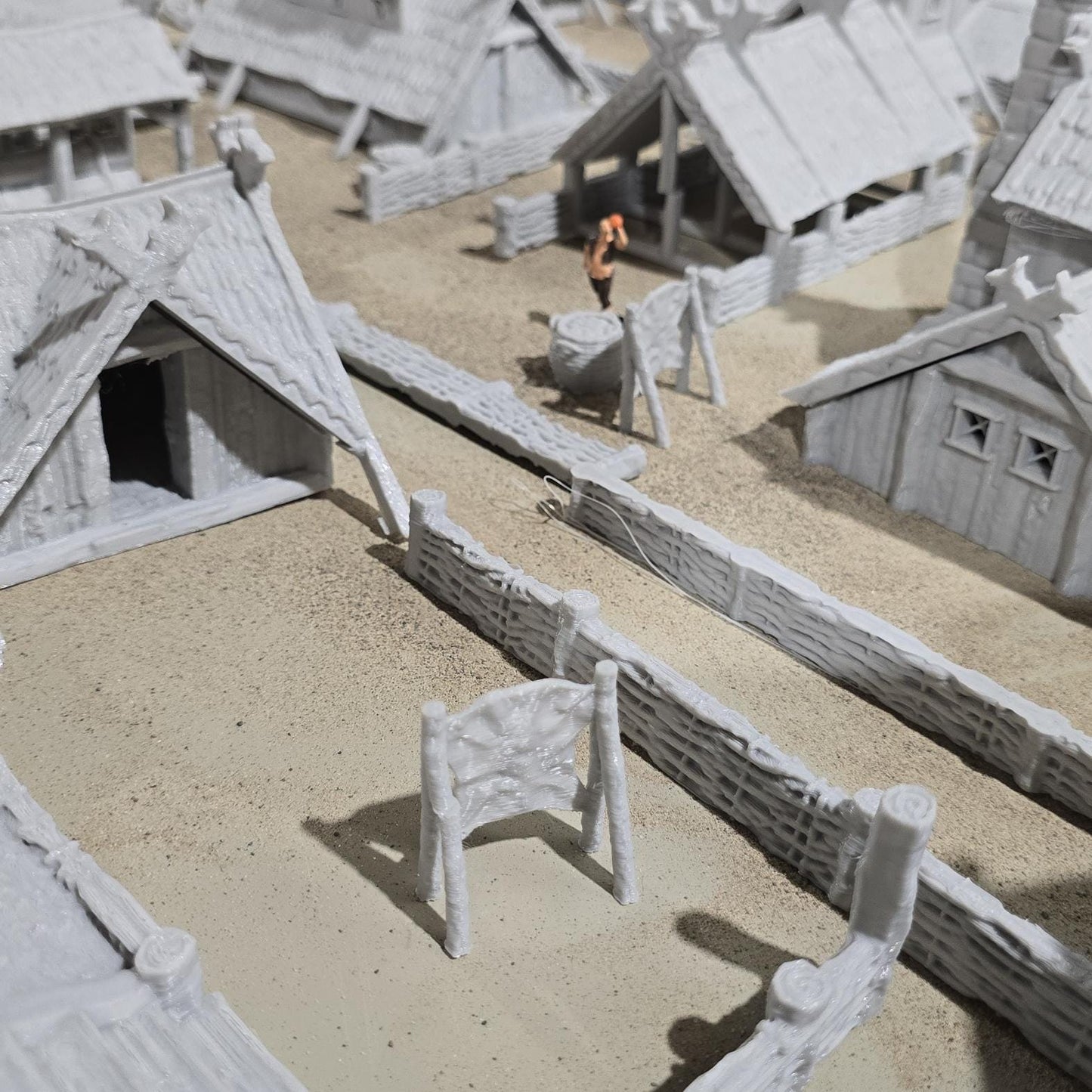 six towers adds an authentic touchThe assortment of buildings, including houses, a tavern, a storehouse, a shipbuilder's workshop, and farm buildings, offers a glimpse into various aspects of Viking life and activities.