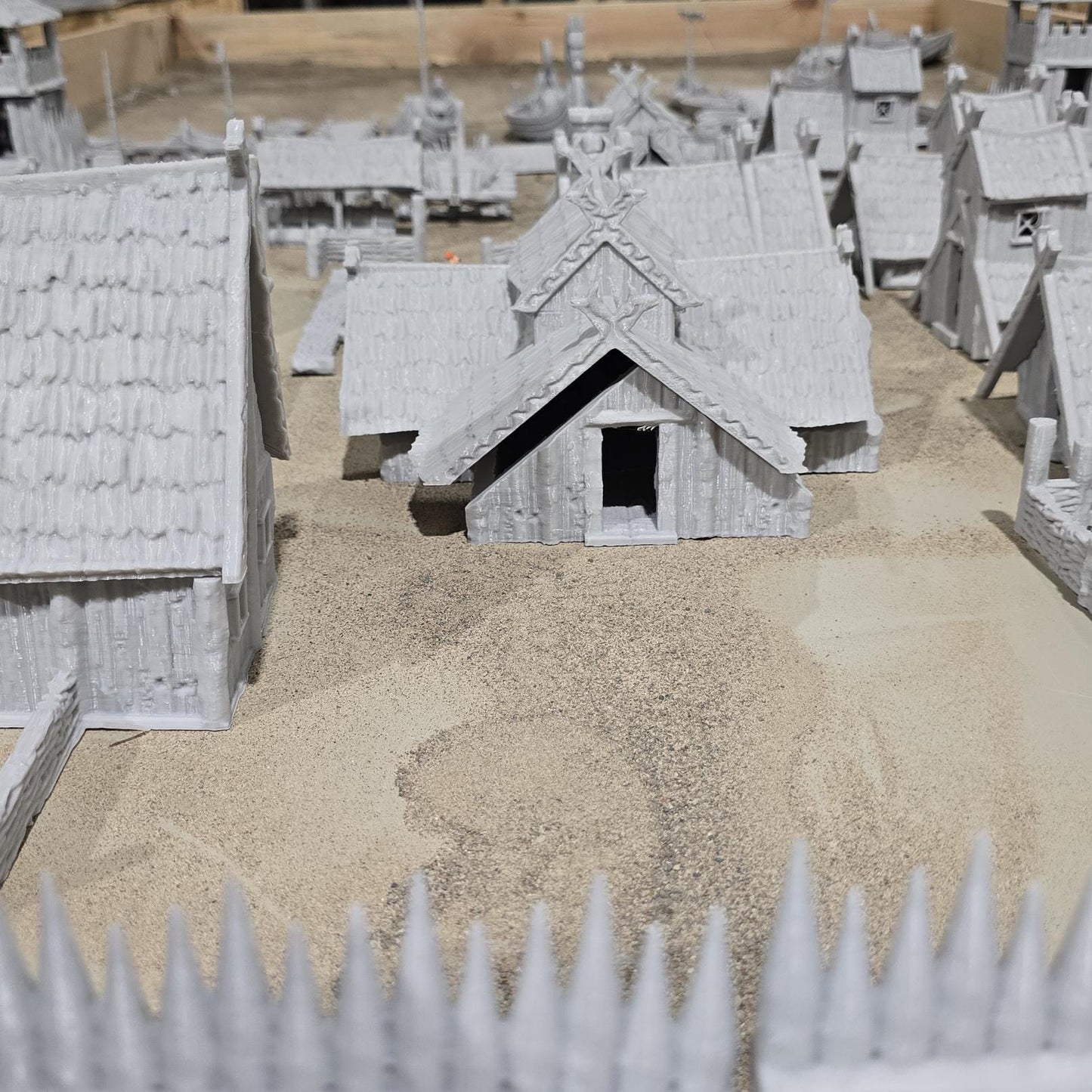 six towers adds an authentic touchThe assortment of buildings, including houses, a tavern, a storehouse, a shipbuilder's workshop, and farm buildings, offers a glimpse into various aspects of Viking life and activities.