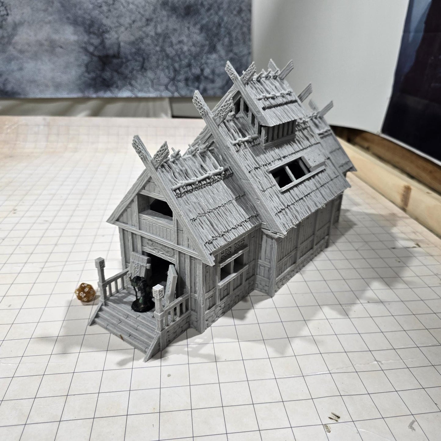 The Viking Era Nordic Longhouse by DarkRealmsForge features traditional Norse carvings and rugged wooden textures, ideal for historical RPGs and reenactment skirmish games.