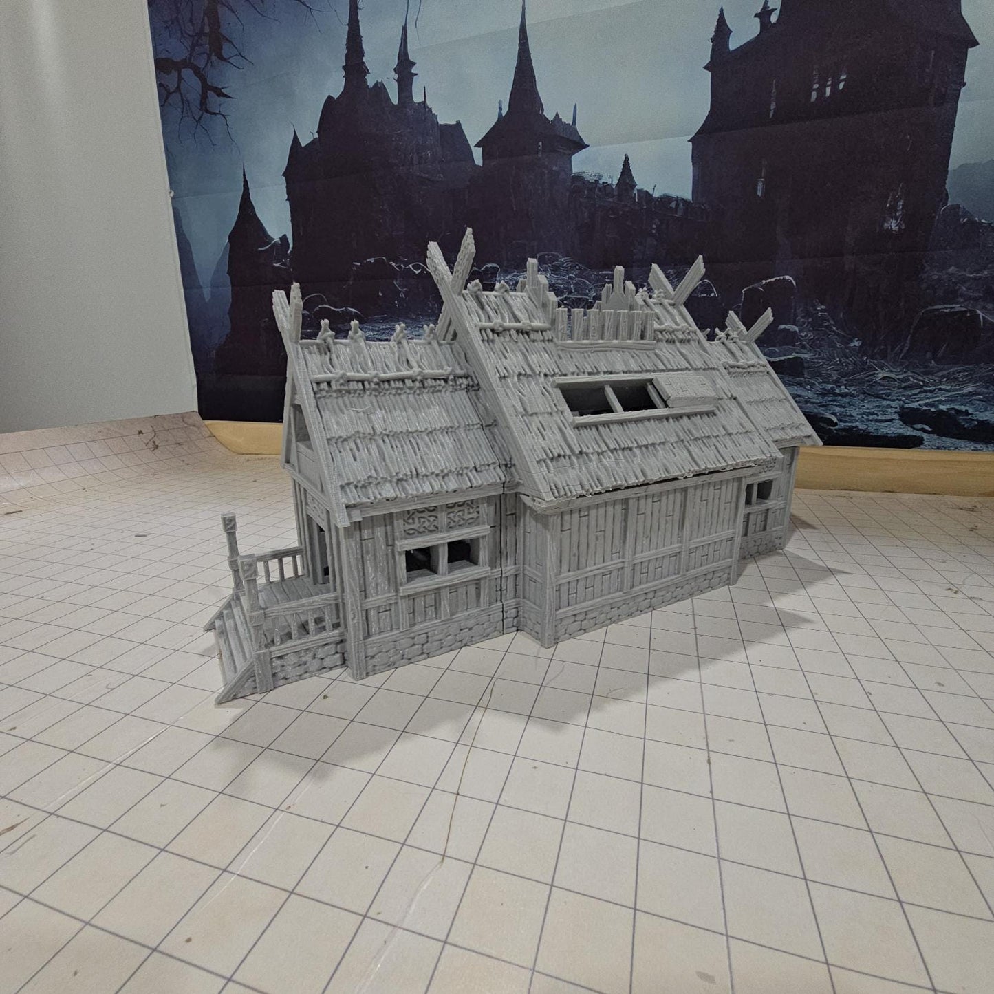 The Viking Era Nordic Longhouse by DarkRealmsForge features traditional Norse carvings and rugged wooden textures, ideal for historical RPGs and reenactment skirmish games.