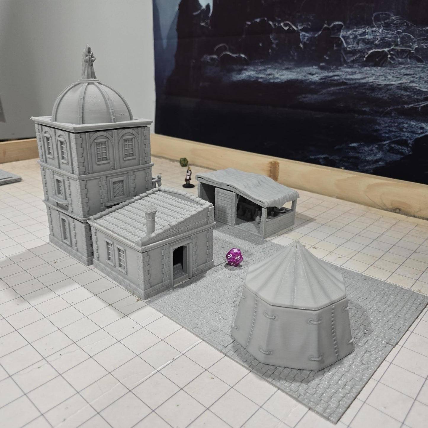 Complete medieval street set with two detailed buildings, a market tent and stall, and five cobblestone roads, perfect for tabletop role-playing games.