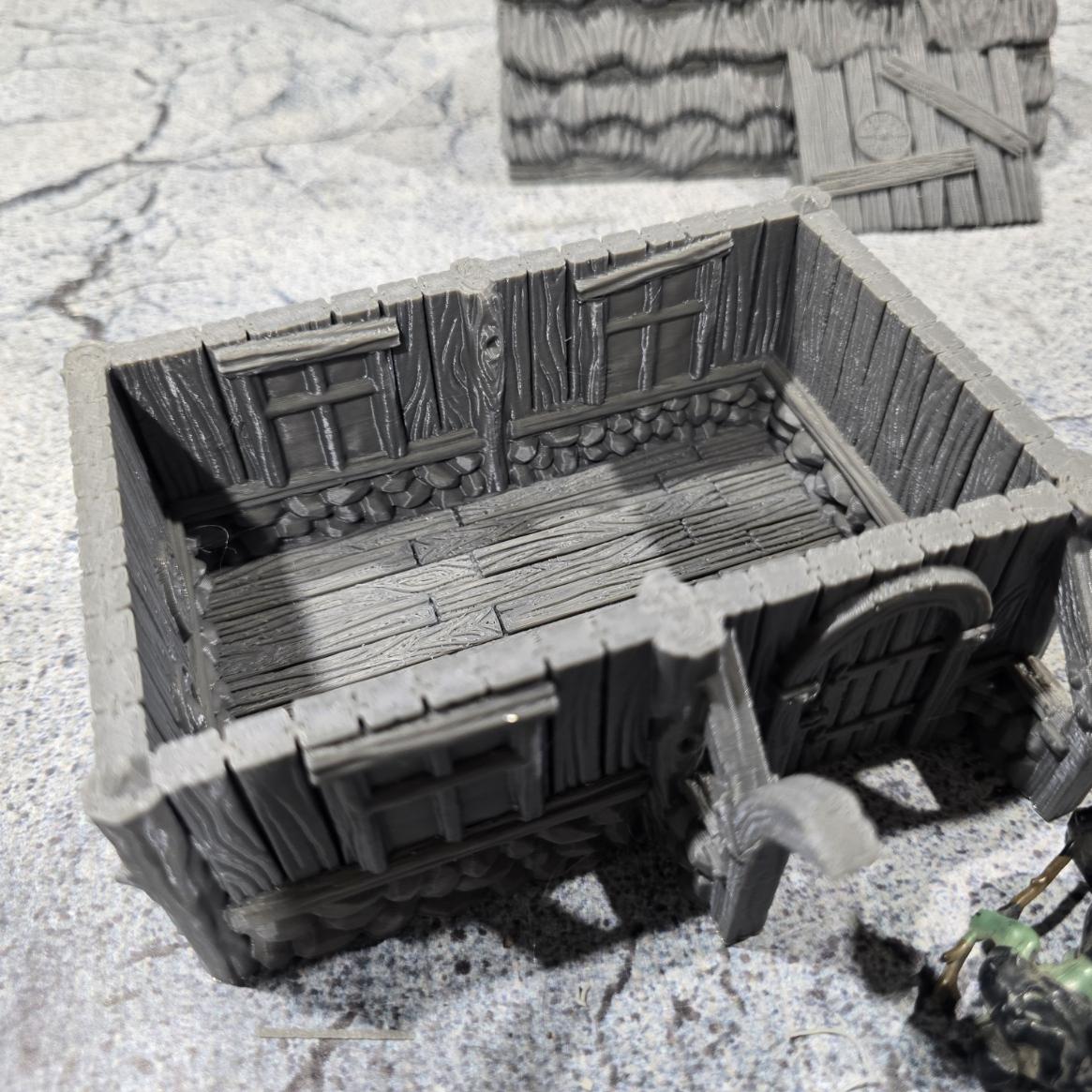 Exquisitely detailed Small Viking Common House model, showcasing early medieval architecture perfect for tabletop role-playing and wargames.