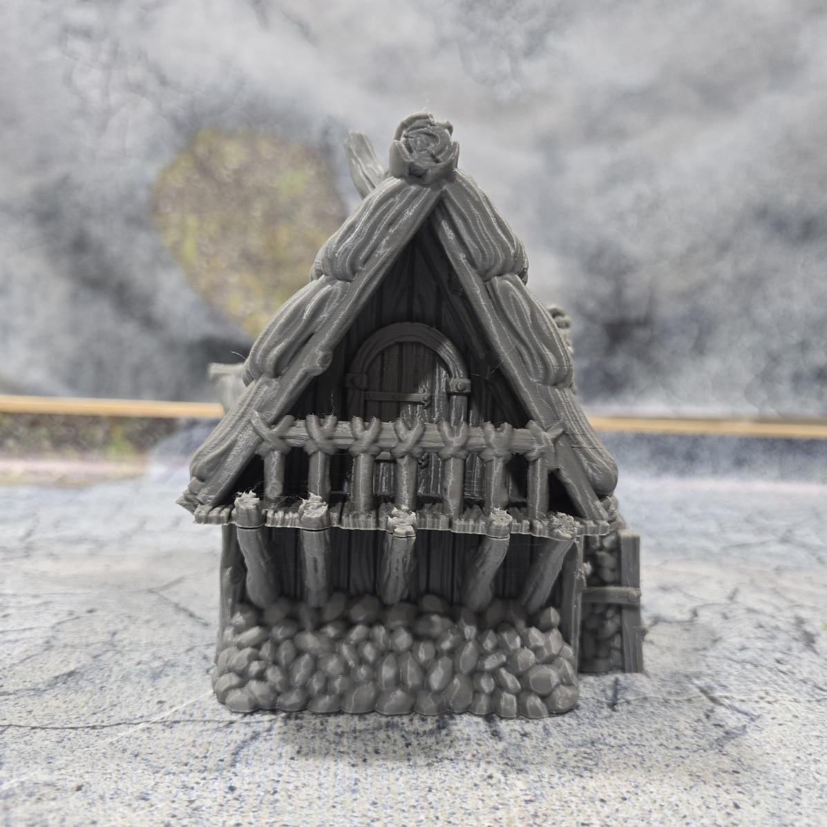 Discover the Achievement Building, Medieval Nordic Lodge, expertly designed for historical and fantasy settings, showcasing fine craftsmanship and an authentic look suitable for various tabletop games.