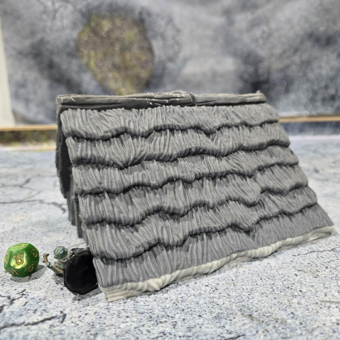 "Explore the life of a Viking with this accurately modeled Common House, featuring a detailed interior and rugged exterior, perfect for historical tabletop games."