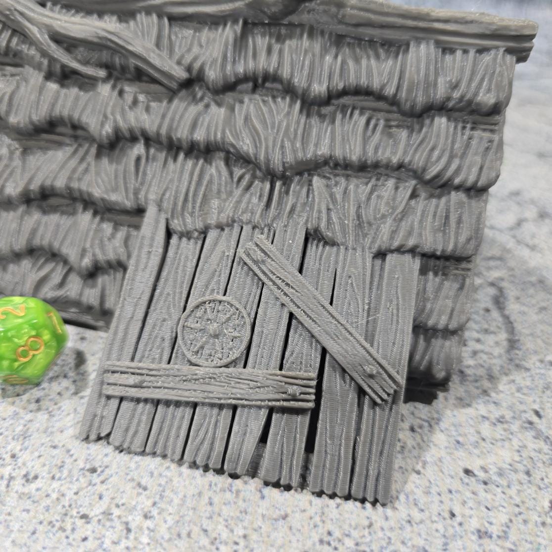 Exquisitely detailed Small Viking Common House model, showcasing early medieval architecture perfect for tabletop role-playing and wargames.
