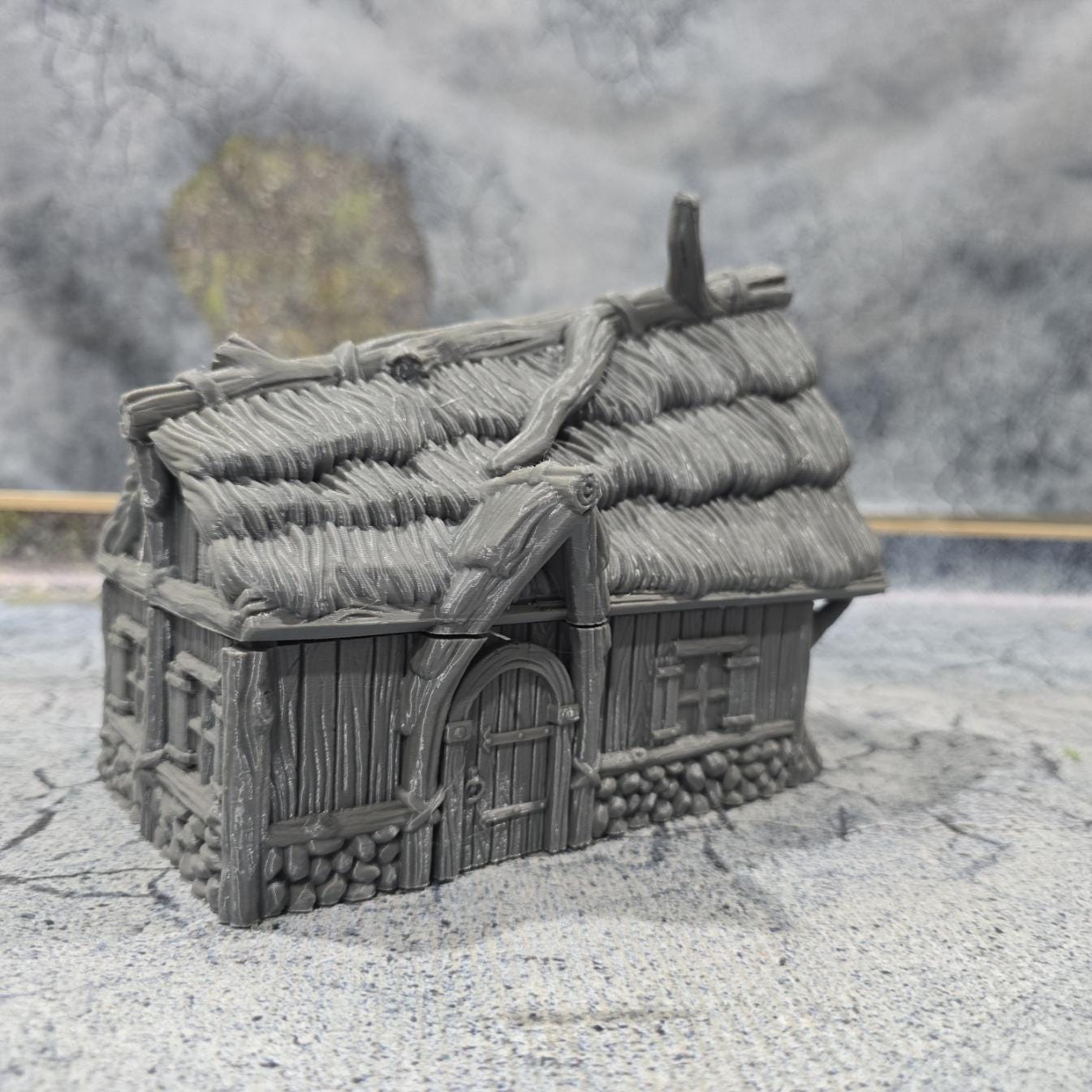 Discover the Achievement Building, Medieval Nordic Lodge, expertly designed for historical and fantasy settings, showcasing fine craftsmanship and an authentic look suitable for various tabletop games.
