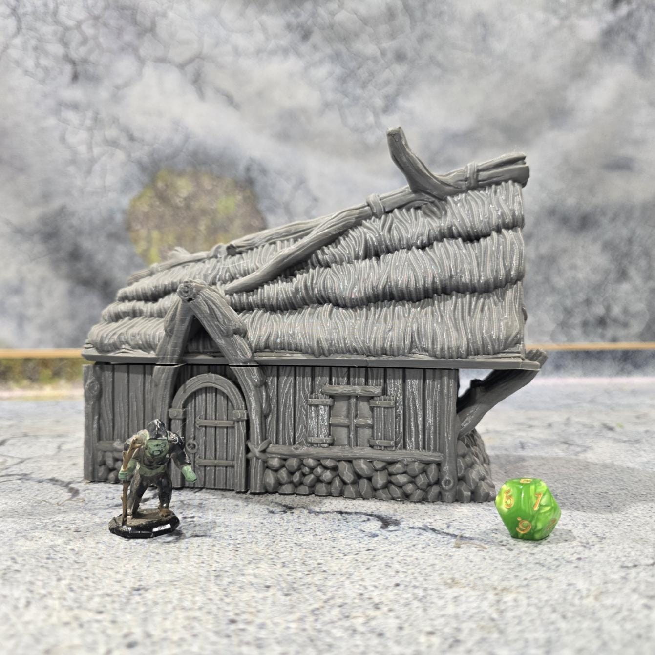 Discover the Achievement Building, Medieval Nordic Lodge, expertly designed for historical and fantasy settings, showcasing fine craftsmanship and an authentic look suitable for various tabletop games.