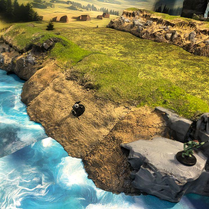 River’s Edge Gentle Erosion – 25 inches of detailed, modular riverbank terrain for tabletop RPGs and wargames, featuring natural erosion, high-ground tactics, and immersive storytelling potential.