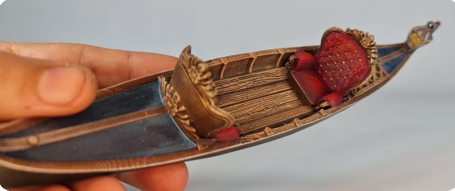A luxurious Venetian gondola glides through the canals, its carved wooden sides gleaming with gold trim. Rich red cushions invite passengers to relax while a gondolier guides the boat past the city’s storied facades. A scene of elegance and intrigue unfolds, waiting for adventurers to board.