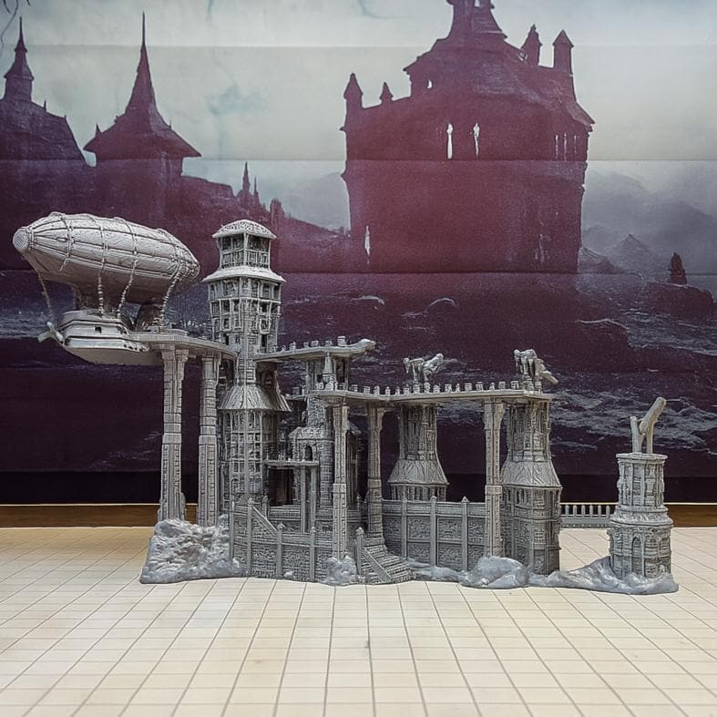 Command the skies from your dwarven mountain citadel — where zeppelins dock and stories begin.”
“No modular gimmicks — just a towering, fixed fortress with airship and cranes ready for battle.”
“The ultimate fantasy centerpiece terrain — defend the port or launch into high-altitude campaigns.”