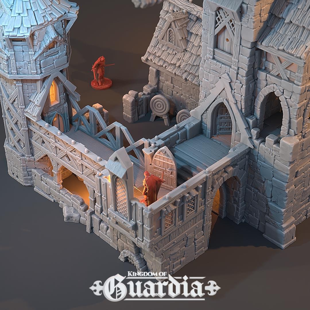 The Archery School – The Butts Compound rises with fortified stone walls, timber bridges, and training yards. The courtyard features archery targets, while towers and walkways provide elevated positions. Lit interiors and removable roofs make it fully playable, perfect for training encounters or dramatic battles.
