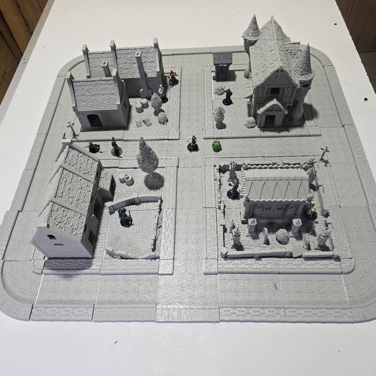 Step into the Greendale Colonial Village, a fully playable 28mm tabletop town. With cobblestone streets, detailed scatter, and four unique starter blocks, this set is ready for storytelling straight out of the box — and fully expandable with 25+ future buildings, a castle, and fortifications.