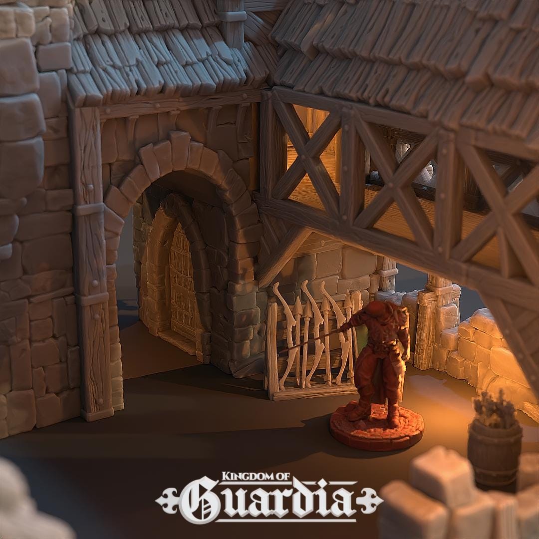 The Archery School – The Butts Compound rises with fortified stone walls, timber bridges, and training yards. The courtyard features archery targets, while towers and walkways provide elevated positions. Lit interiors and removable roofs make it fully playable, perfect for training encounters or dramatic battles.