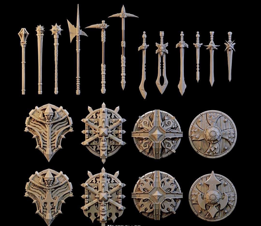 This 40-piece unpainted gray PLA set includes two of each weapon and shield shown—ornate polearms, blades, armored shields, and circular emblem shields—designed for 28 mm tabletop terrain and miniature conversions. Every sculpt carries the carved timber and fantasy iconography of the Kingdom of Guardia line, perfect for DnD / Pathfinder / wargaming on a 1-inch grid.