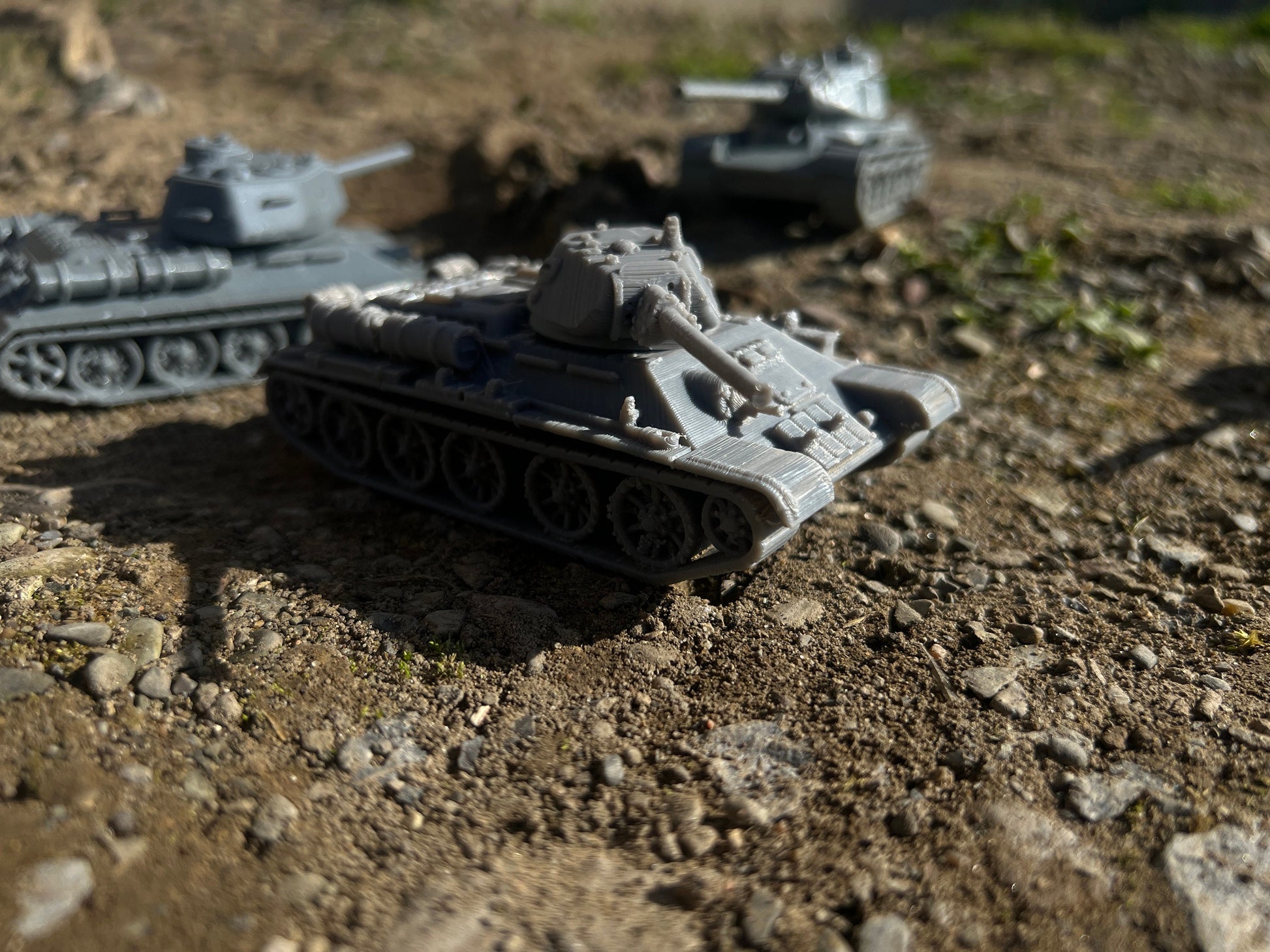 Detailed Soviet WW2 tank models for tabletop gaming, including T-34-85, T-34-57, and IS-1, showcasing historical accuracy and intricate design.