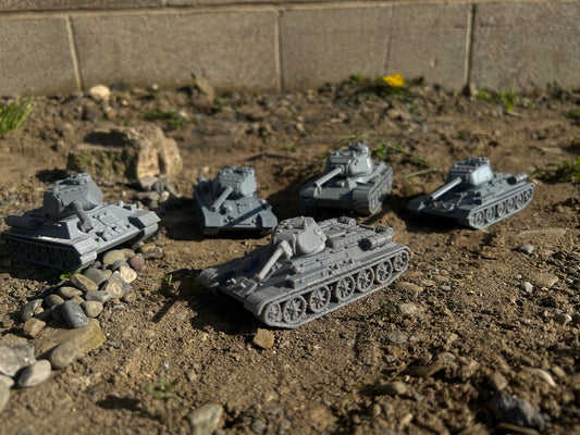 Detailed Soviet WW2 tank models for tabletop gaming, including T-34-85, T-34-57, and IS-1, showcasing historical accuracy and intricate design.
