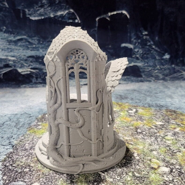 A detailed 3D-printed model of a ruined Elven watchtower for tabletop RPGs like DnD and Pathfinder. Features include intricate stone walls, elegant arches, and remnants of Elven craftsmanship. Perfect for fantasy and historical settings