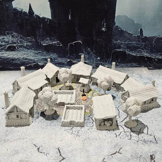 Detailed 28mm simple village set for tabletop RPGs, featuring various farm buildings and rustic structures with intricate designs. Perfect for creating immersive rural village scenes in games like D&D and Pathfinder.