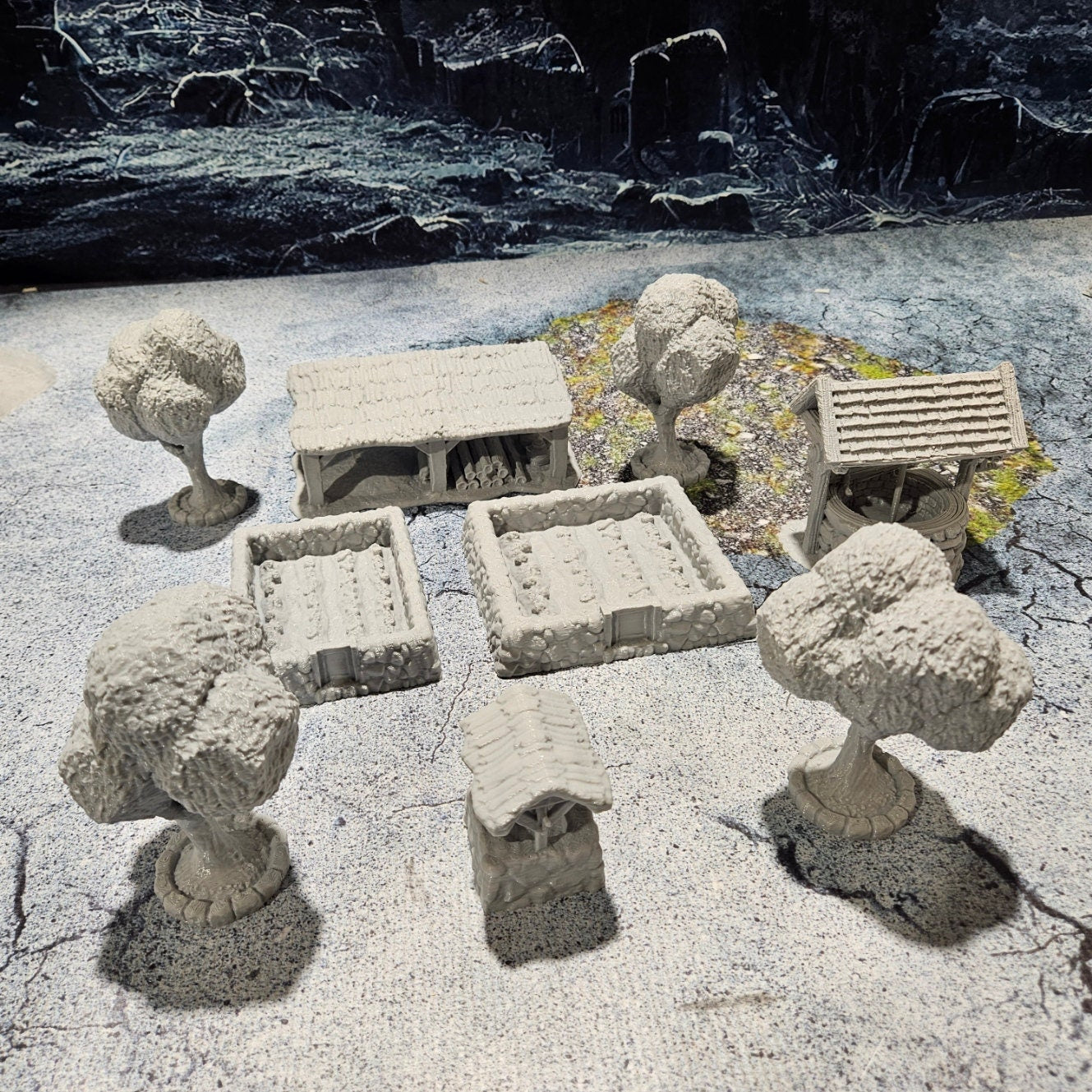 Detailed 28mm simple village set for tabletop RPGs, featuring various farm buildings and rustic structures with intricate designs. Perfect for creating immersive rural village scenes in games like D&D and Pathfinder.