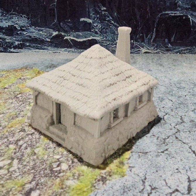 Detailed 28mm simple village set for tabletop RPGs, featuring various farm buildings and rustic structures with intricate designs. Perfect for creating immersive rural village scenes in games like D&D and Pathfinder.