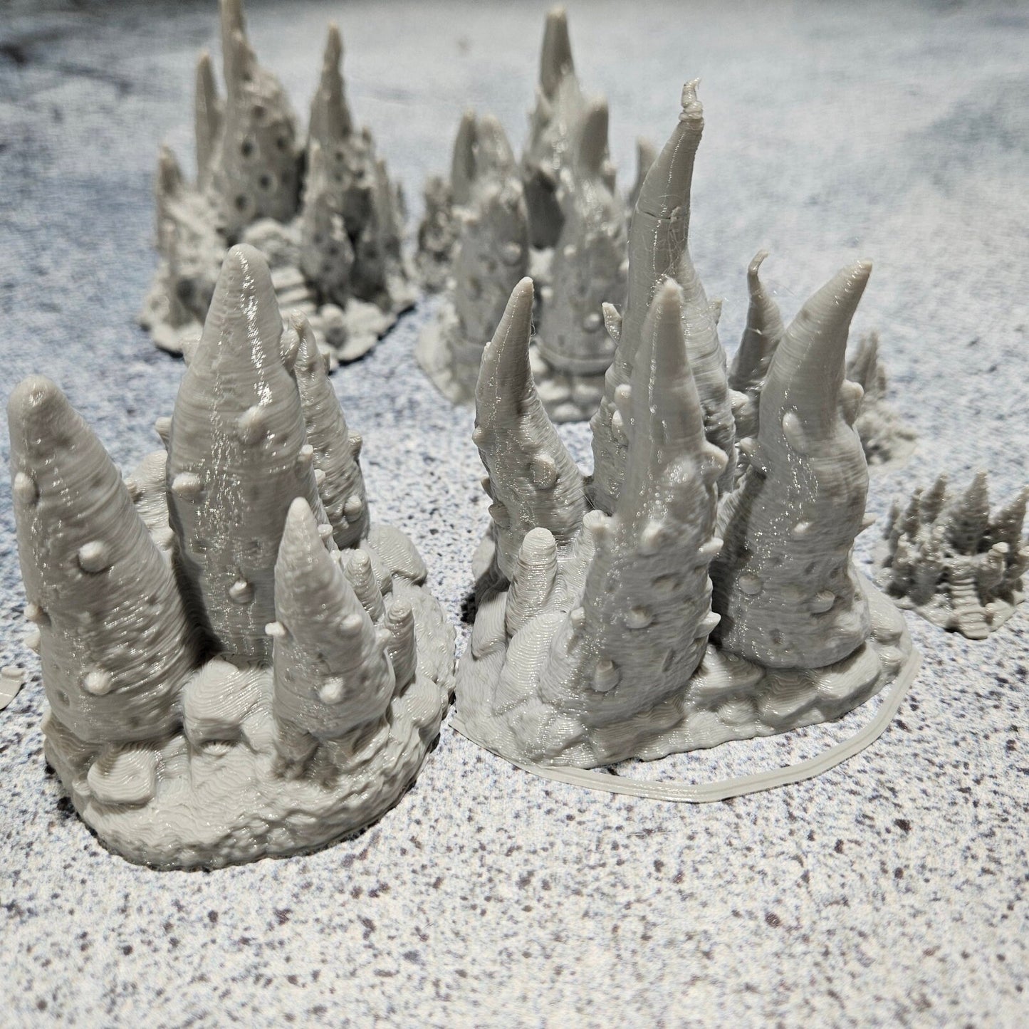 Highly detailed 3D-printed fungal clusters for tabletop RPGs like DnD and Pathfinder. Features include realistic textures of mushrooms, spores, and infected growths, perfect for mystical forests and infected zones.