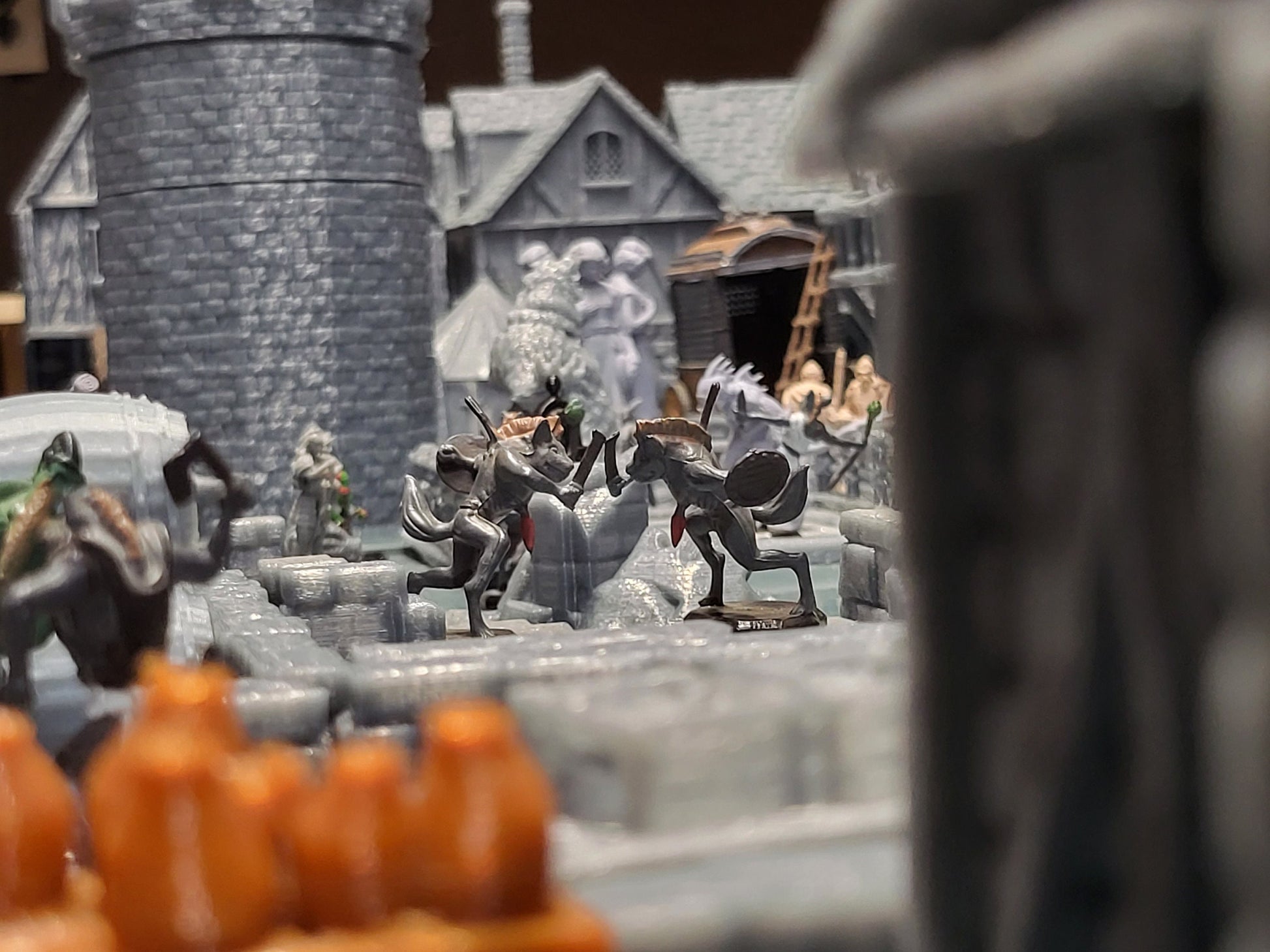 Detailed 28mm modular town district set for tabletop RPGs, featuring various buildings and modular components with intricate designs. Perfect for creating dynamic town scenes in games like D&D and Pathfinder.