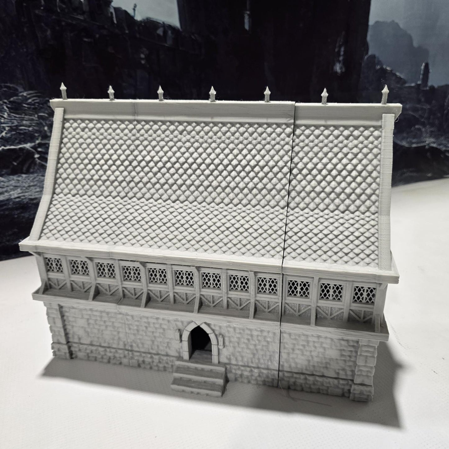 A detailed 3D-printed model of a modular warehouse for tabletop RPGs like DnD and Pathfinder. Features include brick walls, metal beams, storage crates, shelving units, and broken machinery. Perfect for urban and industrial gaming scenarios