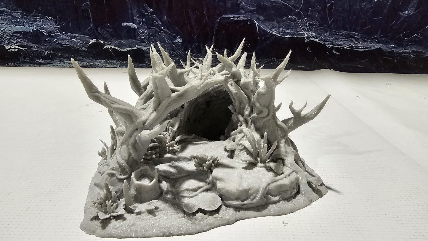 Forest Underground Entrance for tabletop wargaming featuring a hidden cavern entrance with detailed foliage and rock formations. Ideal for forest adventures and dungeon crawls in Warhammer, D&D, Pathfinder, and fantasy-themed games.