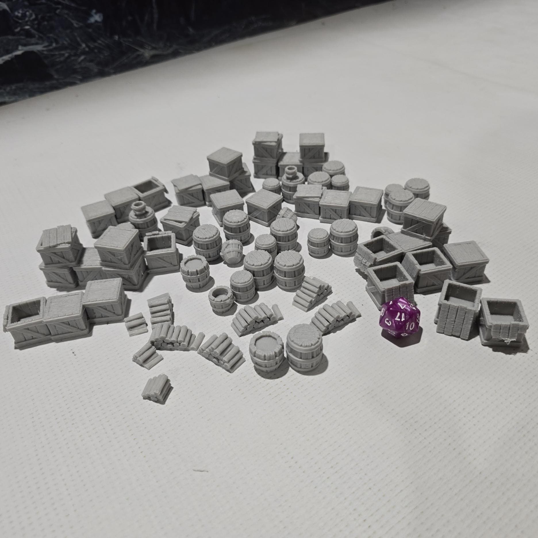 scatter terrain pack includes a variety of crates, barrels, and other miscellaneous objects, perfect for adding realistic details to your medieval or fantasy tabletop games. intricately designed with textures that mimic real wood and metal.