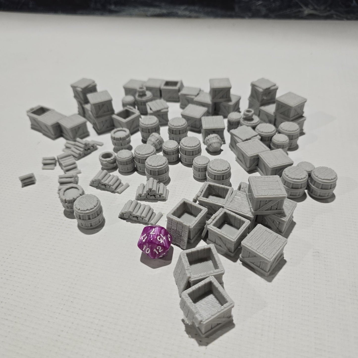 scatter terrain pack includes a variety of crates, barrels, and other miscellaneous objects, perfect for adding realistic details to your medieval or fantasy tabletop games. intricately designed with textures that mimic real wood and metal.