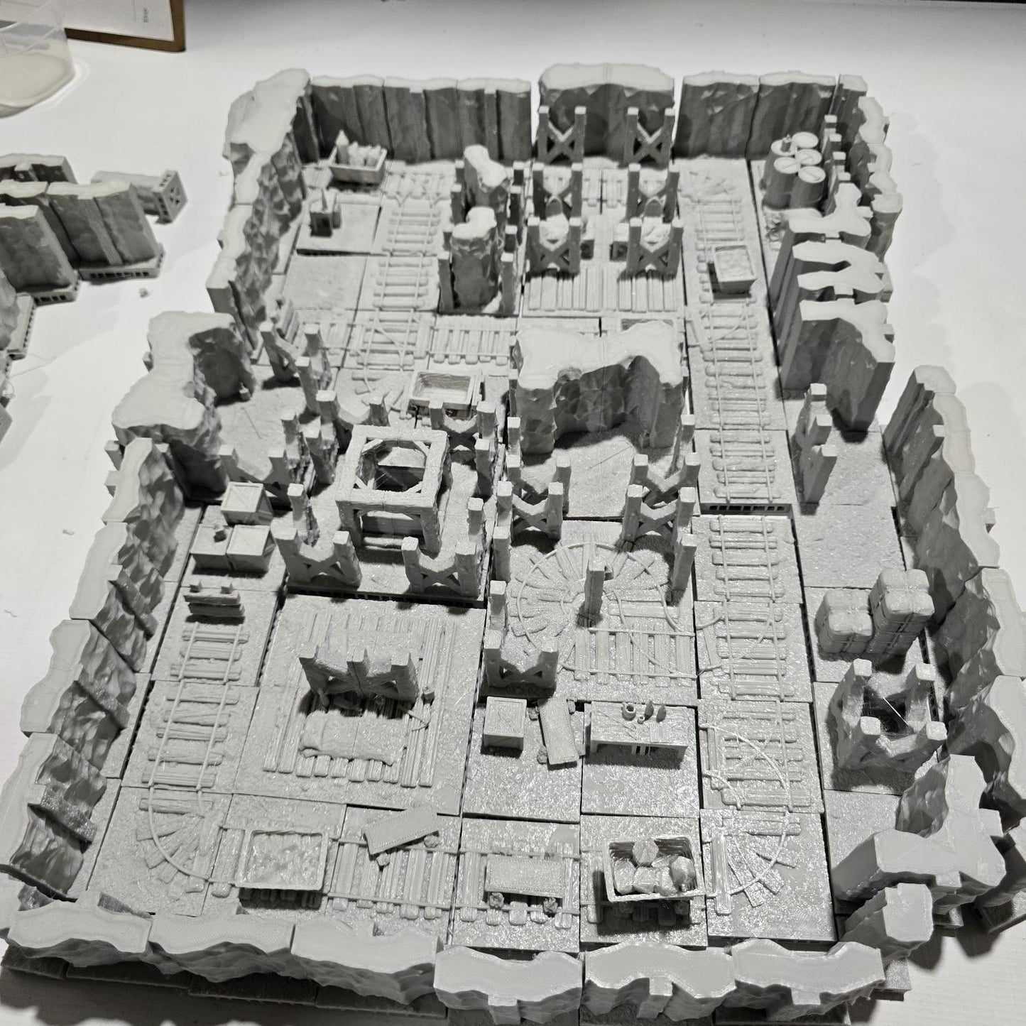 old desert mineshaft, designed for tabletop RPGs like DnD and Pathfinder. stone walls, wooden beams, mining equipment, rail tracks, and mine carts. The realistic textures and debris scattered around add depth and immersion to gaming scenarios.