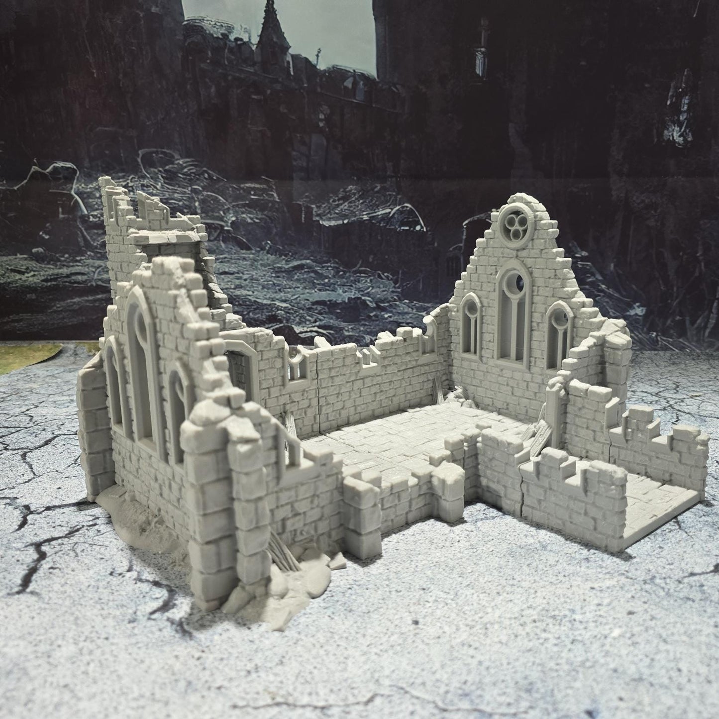 Medieval &quot;Kasenport Church Ruin&quot; model for tabletop gaming; features Gothic architecture with intricate details like cracked walls and stained glass remnants.