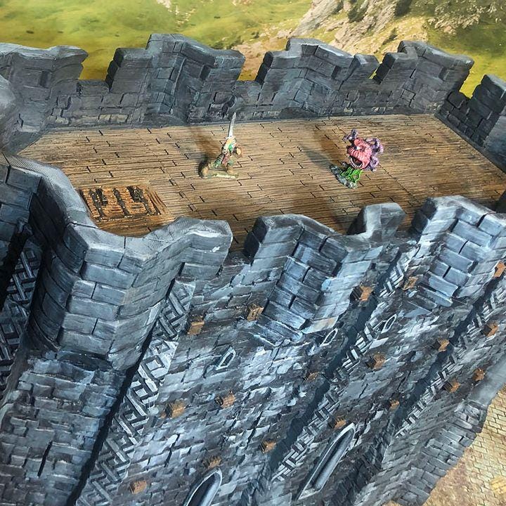 This fortified medieval church is a multi-level structure with intricate stonework, battlements, and arched windows. Perfect for tabletop RPGs and wargames, the model features detailed textures and ample space