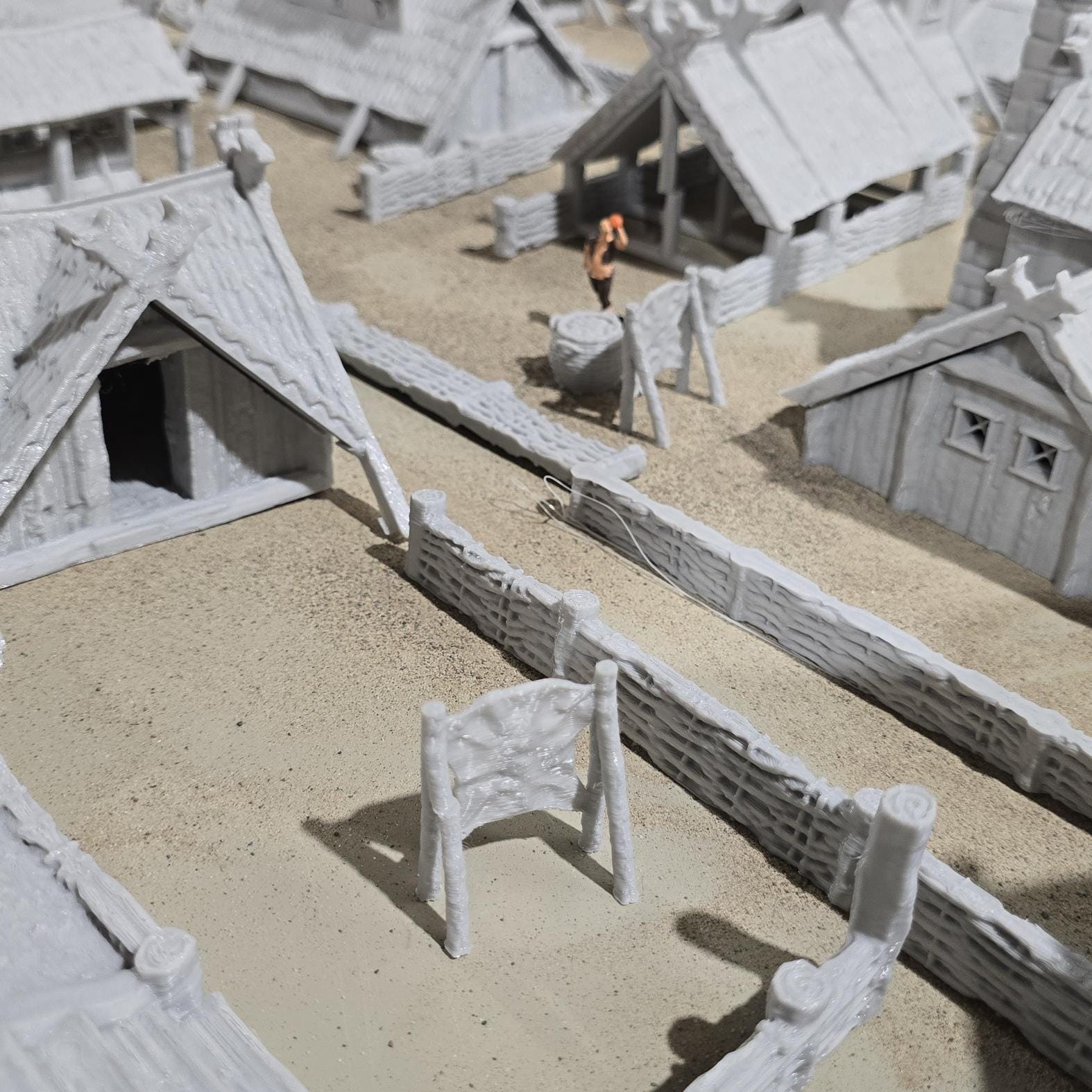 six towers adds an authentic touchThe assortment of buildings, including houses, a tavern, a storehouse, a shipbuilder&#39;s workshop, and farm buildings, offers a glimpse into various aspects of Viking life and activities.