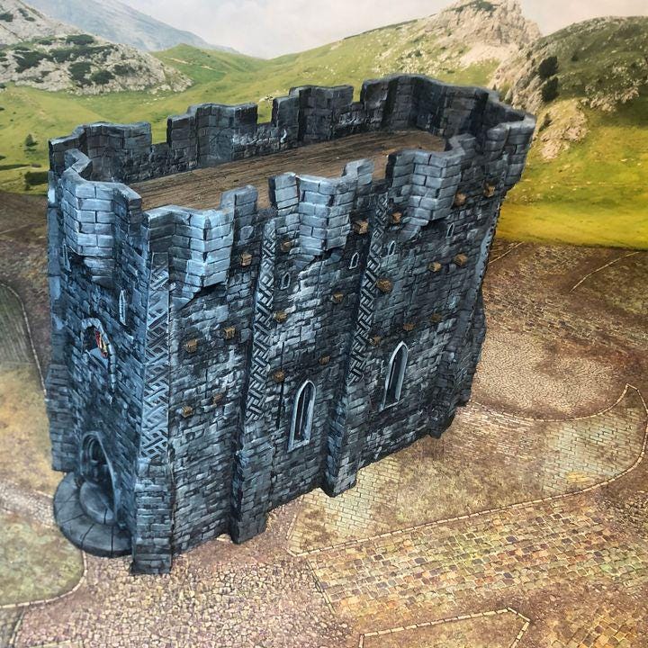 This fortified medieval church is a multi-level structure with intricate stonework, battlements, and arched windows. Perfect for tabletop RPGs and wargames, the model features detailed textures and ample space