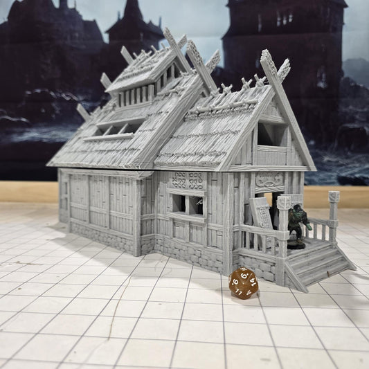 The Viking Era Nordic Longhouse by DarkRealmsForge features traditional Norse carvings and rugged wooden textures, ideal for historical RPGs and reenactment skirmish games.