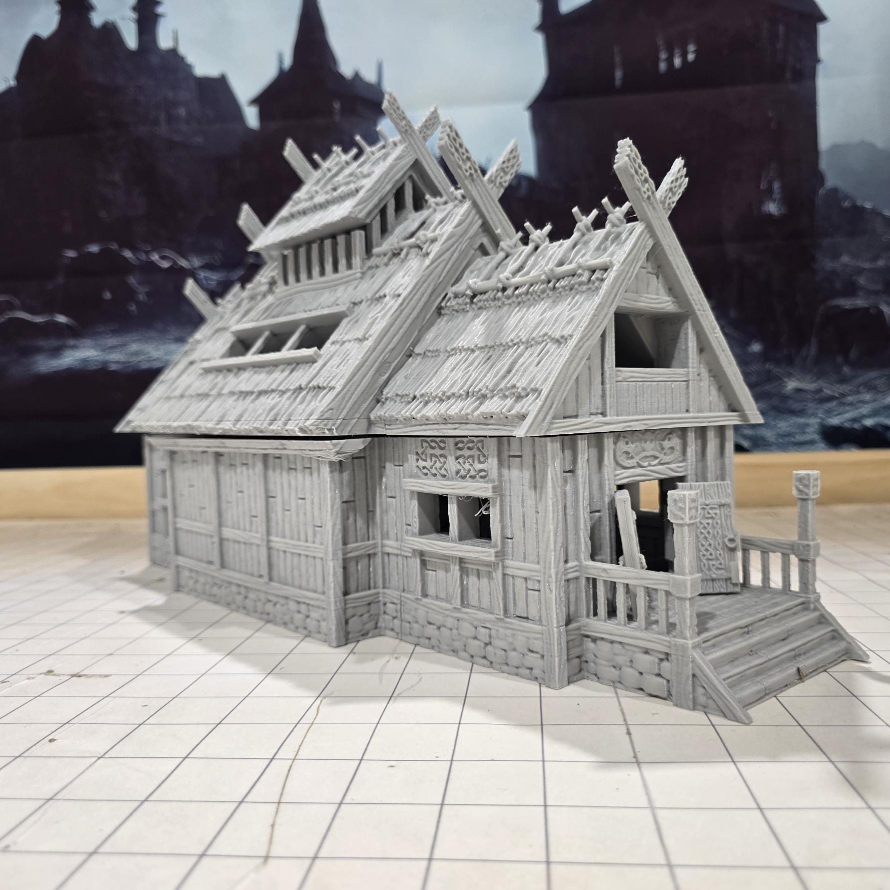 The Viking Era Nordic Longhouse by DarkRealmsForge features traditional Norse carvings and rugged wooden textures, ideal for historical RPGs and reenactment skirmish games.