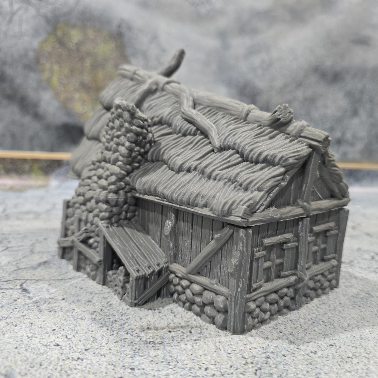 Discover the Achievement Building, Medieval Nordic Lodge, expertly designed for historical and fantasy settings, showcasing fine craftsmanship and an authentic look suitable for various tabletop games.