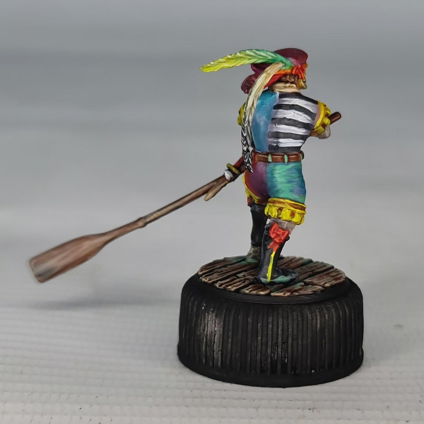 A luxurious Venetian gondola glides through the canals, its carved wooden sides gleaming with gold trim. Rich red cushions invite passengers to relax while a gondolier guides the boat past the city’s storied facades. A scene of elegance and intrigue unfolds, waiting for adventurers to board.