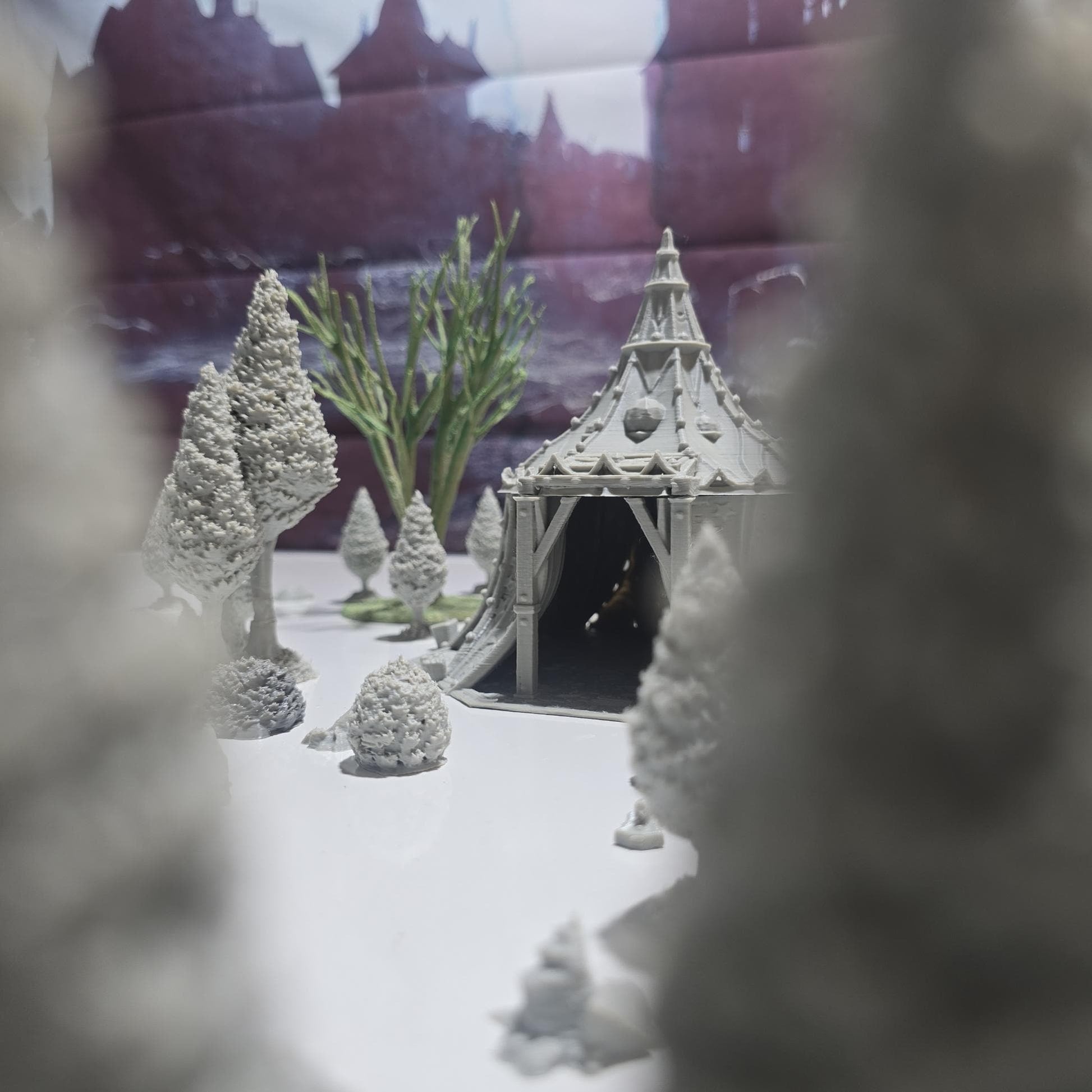 A star-patterned medieval fantasy tent glows with an otherworldly light, its interior revealing a robed fortune teller poised behind a crystal ball. The sweeping fabric walls and tall spire create an aura of mystery, perfect for a marketplace encounter, a festival scene, or a secret meeting in your next tabletop adventure.