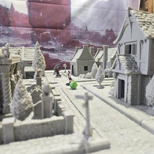 Step into the Greendale Colonial Village, a fully playable 28mm tabletop town. With cobblestone streets, detailed scatter, and four unique starter blocks, this set is ready for storytelling straight out of the box — and fully expandable with 25+ future buildings, a castle, and fortifications.