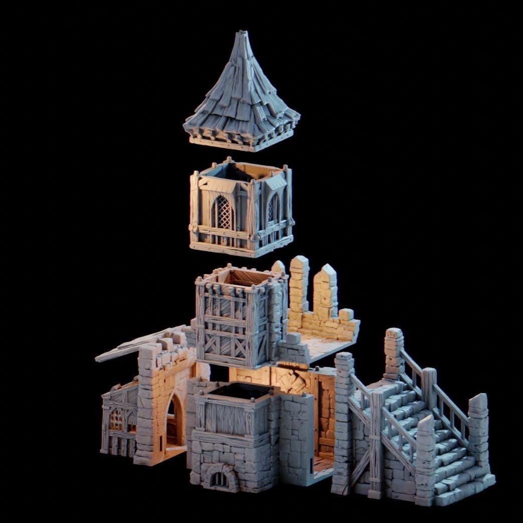 The Tinker Shop & Town Jail rises in stone and timber, its tower climbing high above the battlements. A fortified gatehouse hides barred cells below, while the upper levels reveal a craftsman’s workshop brimming with mechanical detail. The removable roof and stacked floors open the structure for skirmishes, jailbreaks, and daring rooftop showdowns.