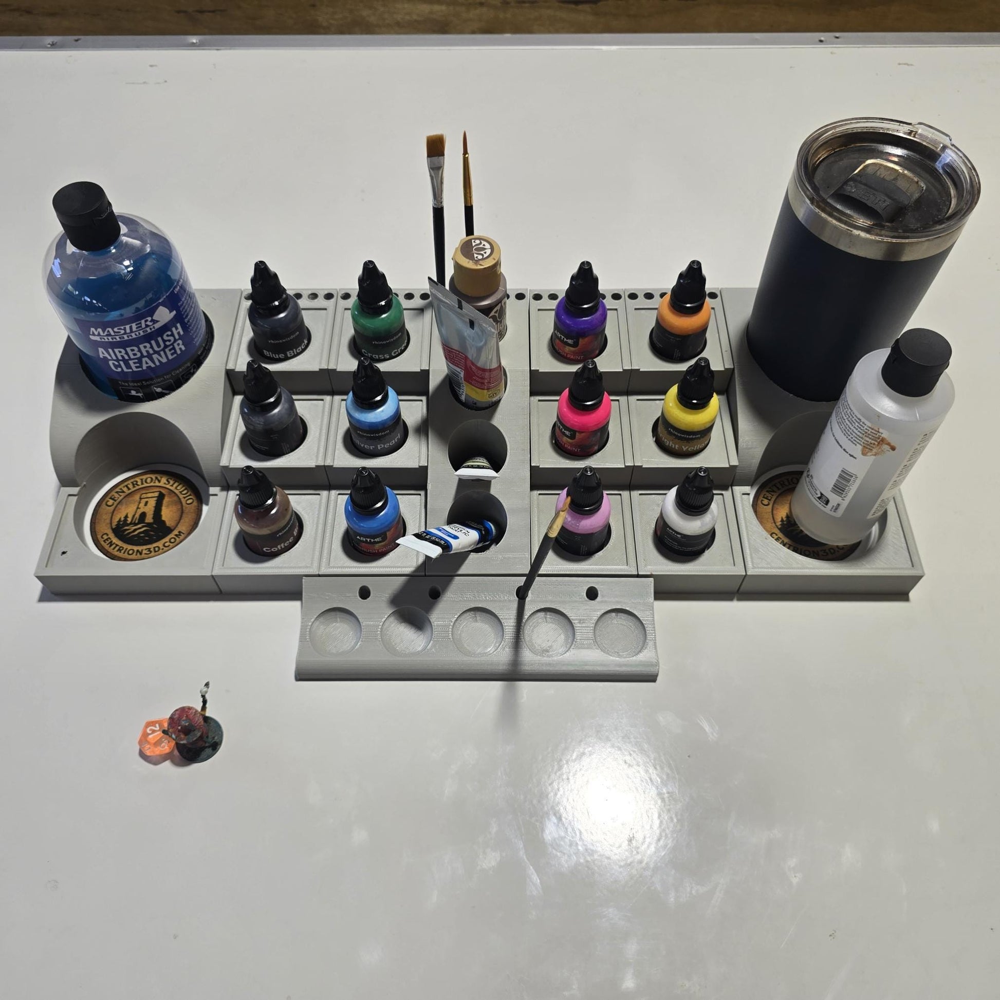 Miniature painting workspace with modular gray PLA trays